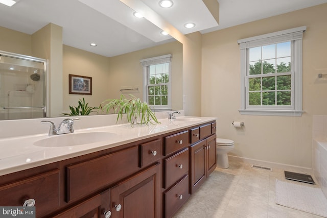 1817 Old Farm Ln, Lancaster, PA 17602 - full bathroom with plenty of natural light, double vanity, a shower with door, a bath, and recessed lighting