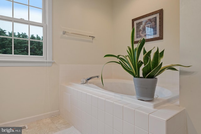 1817 Old Farm Ln, Lancaster, PA 17602 - bathroom with a bath and tile patterned flooring