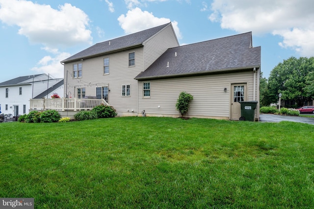 1817 Old Farm Ln, Lancaster, PA 17602 - back of property with a yard, a wooden deck, and a shingled roof
