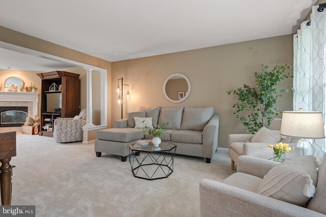 1817 Old Farm Ln, Lancaster, PA 17602 - living room with decorative columns, carpet floors, and a tiled fireplace