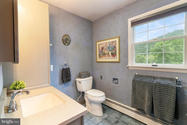 848 Rapp Rd, Howard, PA 16841 - bathroom with a baseboard heating unit, vanity, and tile patterned floors