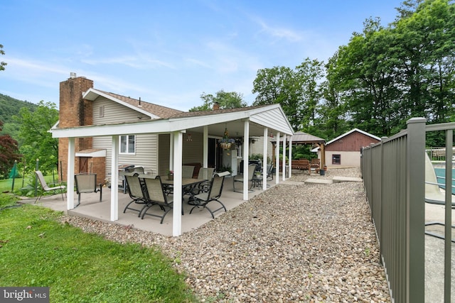 848 Rapp Rd, Howard, PA 16841 - rear view of property with a patio and a chimney