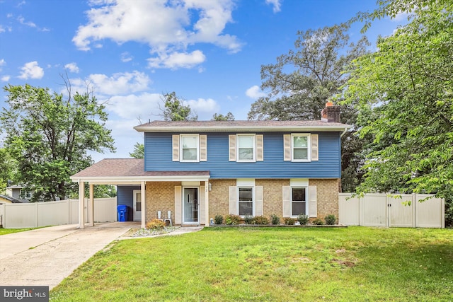 12 Bantry Ct, Waldorf, MD 20602 - view of front of property with concrete driveway, a chimney, an attached carport, a gate, and brick siding