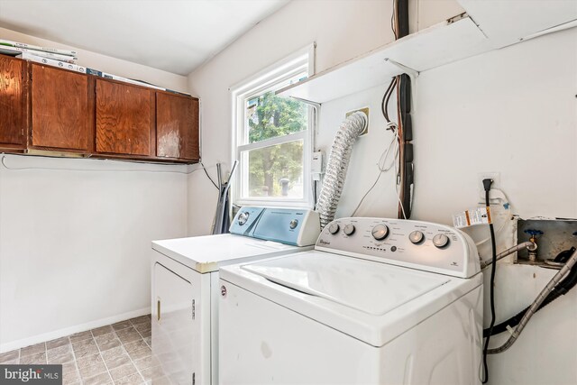 12 Bantry Ct, Waldorf, MD 20602 - laundry area featuring cabinet space and washer and dryer