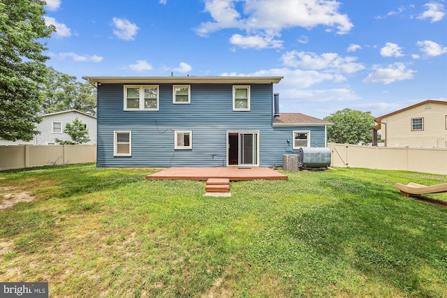 12 Bantry Ct, Waldorf, MD 20602 - back of property featuring a wooden deck, a fenced backyard, and oil tank