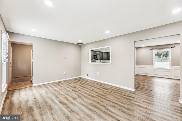 12 Bantry Ct, Waldorf, MD 20602 - unfurnished living room with light wood-style flooring and recessed lighting