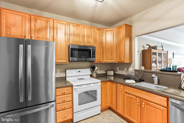 8608 Fluttering Leaf Trl Unit 208, Odenton, MD 21113 - kitchen with appliances with stainless steel finishes and light tile patterned flooring