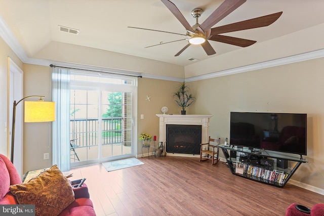 8608 Fluttering Leaf Trl Unit 208, Odenton, MD 21113 - living area with wood finished floors, a lit fireplace, and ceiling fan