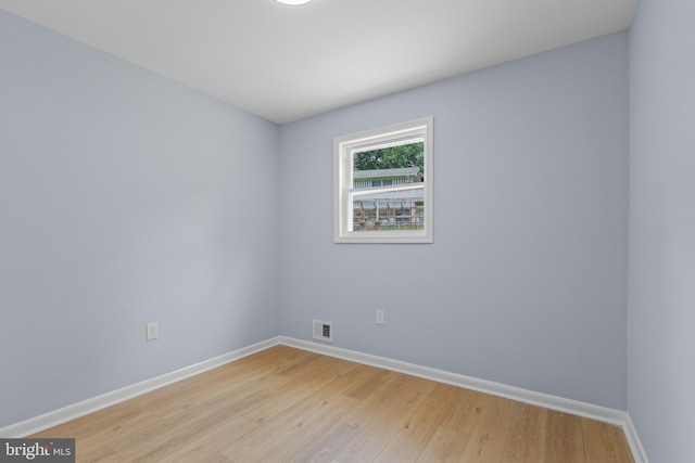 7306 Gavin St, Hyattsville, MD 20784 - empty room featuring light wood finished floors and baseboards