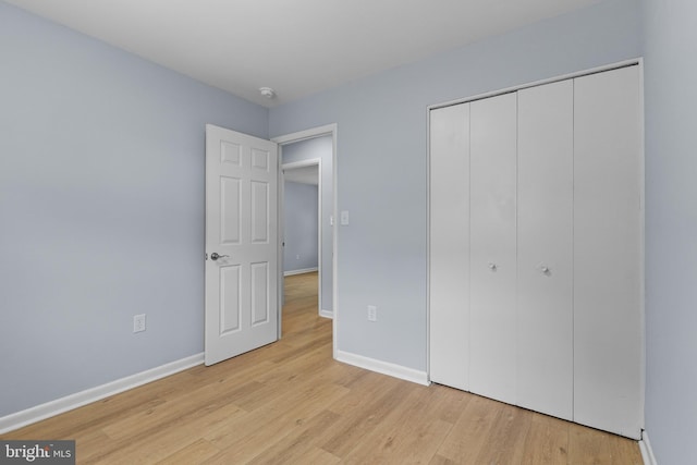 7306 Gavin St, Hyattsville, MD 20784 - unfurnished bedroom with light wood finished floors and a closet