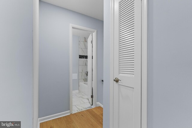 7306 Gavin St, Hyattsville, MD 20784 - hallway featuring baseboards and light wood-type flooring