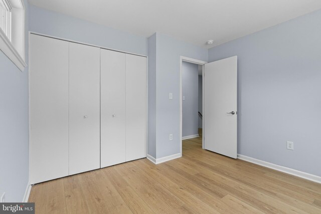 7306 Gavin St, Hyattsville, MD 20784 - unfurnished bedroom with light wood-type flooring and a closet