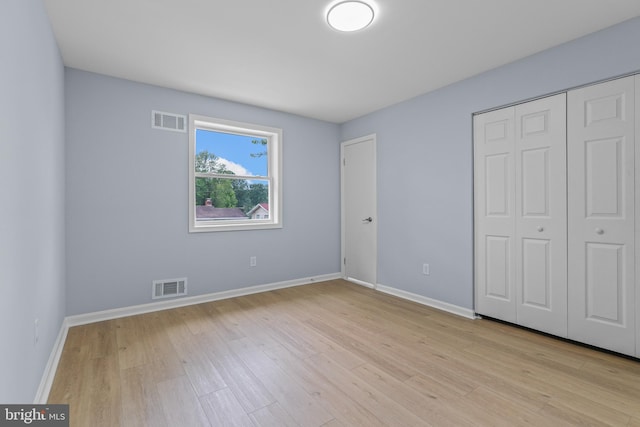 7306 Gavin St, Hyattsville, MD 20784 - unfurnished bedroom with light wood-style floors and a closet