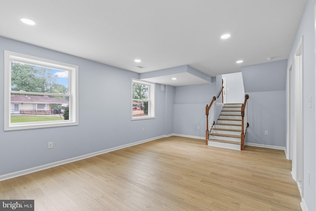 7306 Gavin St, Hyattsville, MD 20784 - below grade area featuring stairway, light wood-style floors, and recessed lighting