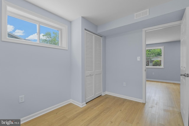 7306 Gavin St, Hyattsville, MD 20784 - unfurnished bedroom with light wood-style floors and a closet