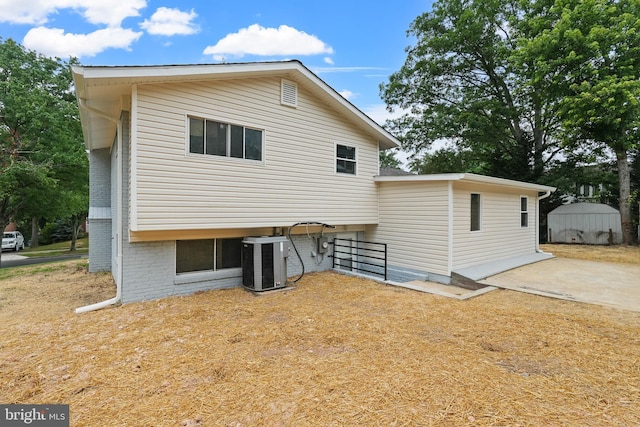 7306 Gavin St, Hyattsville, MD 20784 - back of house featuring a storage unit
