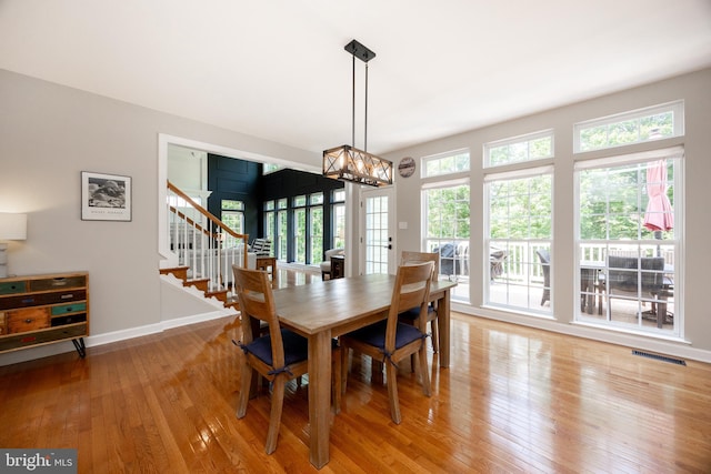 1568 Tattersall, West Chester, PA 19380 - dining room with light wood finished floors and stairway