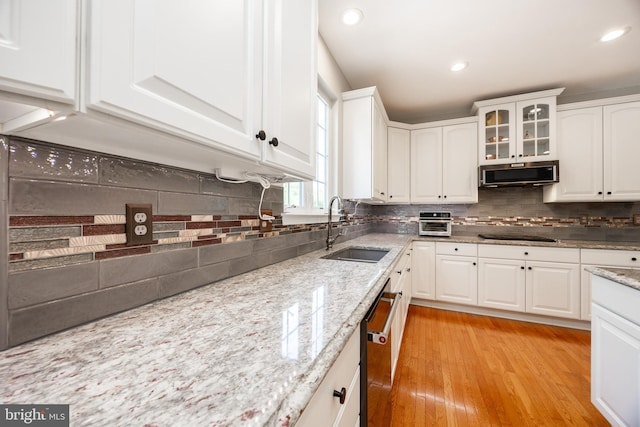 1568 Tattersall, West Chester, PA 19380 - kitchen with stainless steel appliances, backsplash, white cabinetry, and recessed lighting