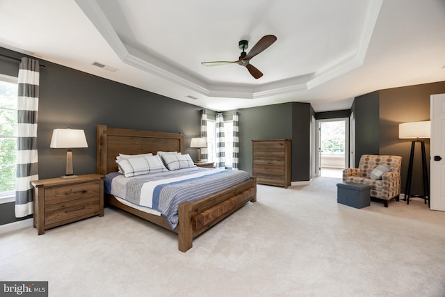 1568 Tattersall, West Chester, PA 19380 - bedroom featuring a tray ceiling, light colored carpet, ornamental molding, and ceiling fan