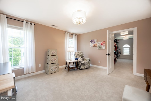 1568 Tattersall, West Chester, PA 19380 - sitting room with healthy amount of natural light, light carpet, and a chandelier
