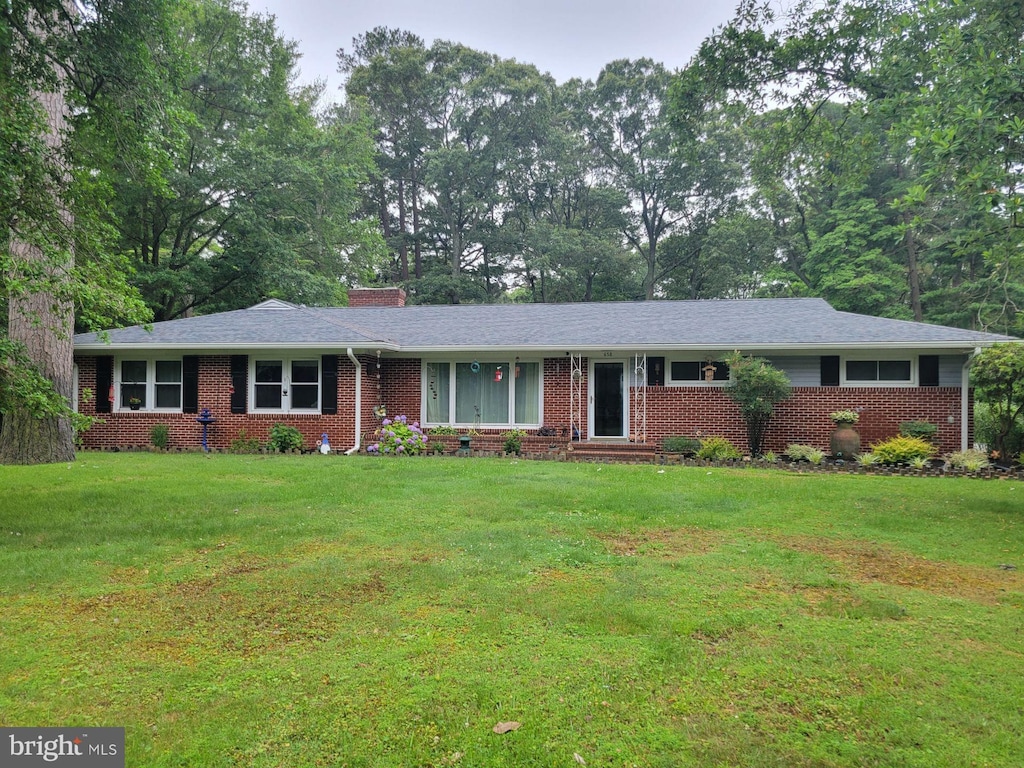 618 Pine Bluff Rd, Salisbury, MD 21801 - ranch-style home featuring brick siding, a chimney, and a front yard