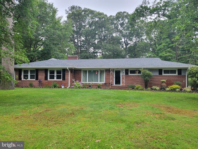 618 Pine Bluff Rd, Salisbury, MD 21801 - ranch-style home featuring brick siding, a chimney, and a front yard