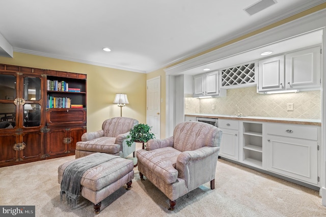 130 Hunt Valley Cir, Berwyn, PA 19312 - living area featuring wet bar, light carpet, crown molding, recessed lighting, and beverage cooler