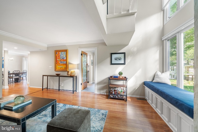 112 Oxley Ct, Newtown Square, PA 19073 - living area featuring wood finished floors, crown molding, and a towering ceiling