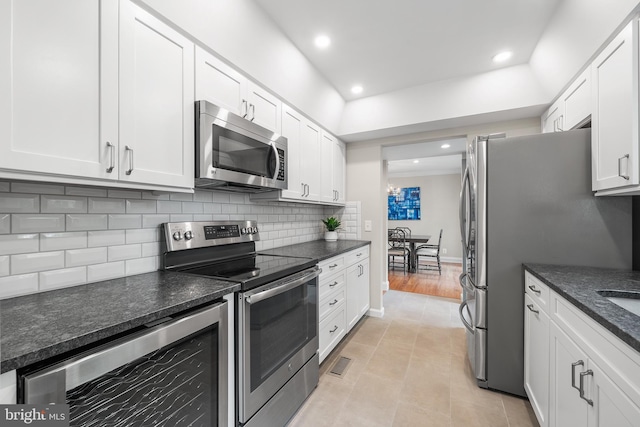 112 Oxley Ct, Newtown Square, PA 19073 - kitchen featuring stainless steel appliances, wine cooler, white cabinetry, decorative backsplash, and recessed lighting