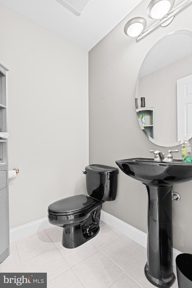 501 Bald Eagle Ct, Lancaster, PA 17601 - bathroom with tile patterned floors and baseboards