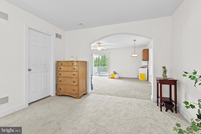 501 Bald Eagle Ct, Lancaster, PA 17601 - living area with carpet, arched walkways, and a ceiling fan