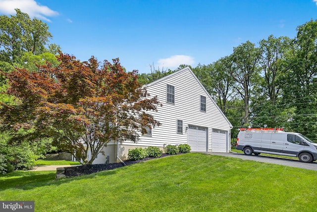 501 Bald Eagle Ct, Lancaster, PA 17601 - view of home's exterior with asphalt driveway, a yard, and an attached garage