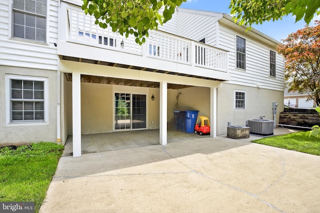 501 Bald Eagle Ct, Lancaster, PA 17601 - back of house featuring a balcony, a patio area, and stucco siding