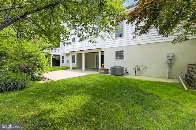 501 Bald Eagle Ct, Lancaster, PA 17601 - back of house featuring a patio, a yard, and stucco siding