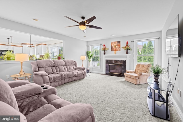 501 Bald Eagle Ct, Lancaster, PA 17601 - carpeted living room featuring a high end fireplace, a ceiling fan, and recessed lighting