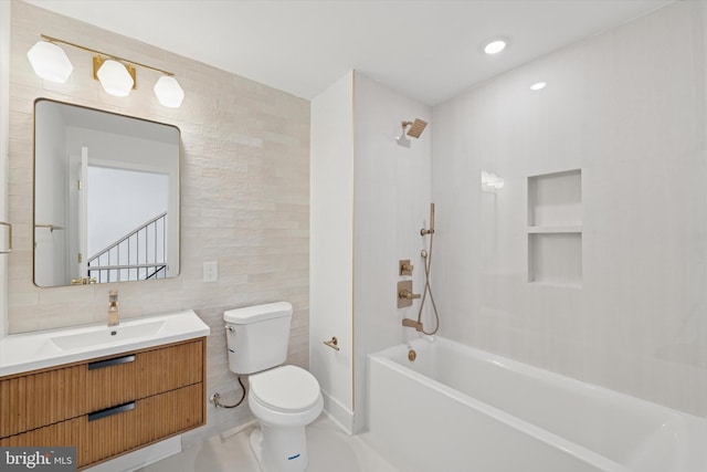 919 S 11th St Unit A, Philadelphia, PA 19147 - bathroom featuring tile walls, shower / tub combination, and vanity