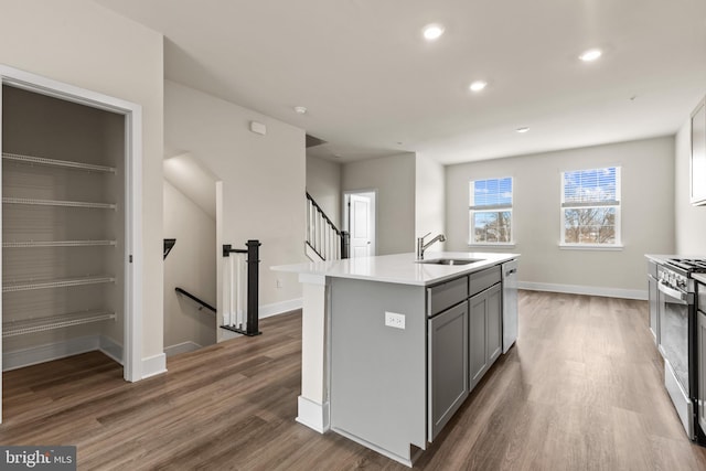 10624 Meridian Hill Way, Upper Marlboro, MD 20772 - kitchen featuring gray cabinetry, gas range, dishwasher, wood finished floors, and recessed lighting