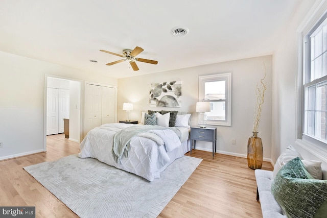 1517 Tuba Ct, Vienna, VA 22182 - bedroom with light wood-type flooring, a closet, and a ceiling fan