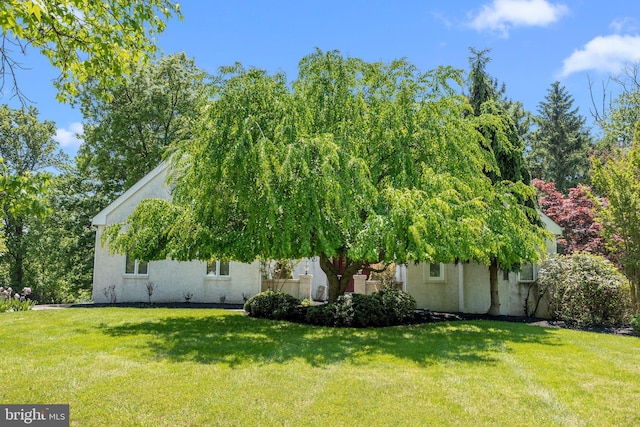 24 Rosette Ln, Richboro, PA 18954 - view of home's exterior with stucco siding and a lawn