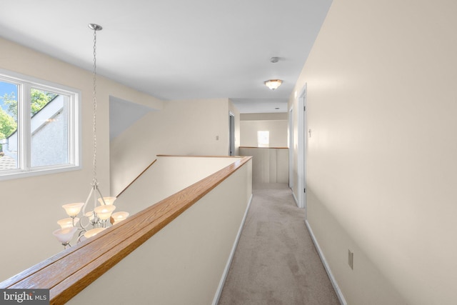24 Rosette Ln, Richboro, PA 18954 - corridor with light colored carpet, an upstairs landing, and a chandelier