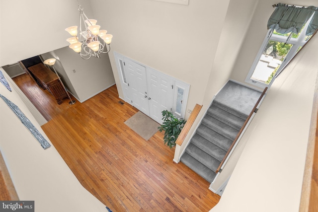 24 Rosette Ln, Richboro, PA 18954 - stairs featuring wood finished floors and a chandelier