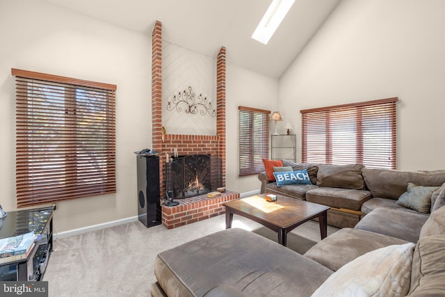 24 Rosette Ln, Richboro, PA 18954 - carpeted living area featuring plenty of natural light, a fireplace, a skylight, and high vaulted ceiling