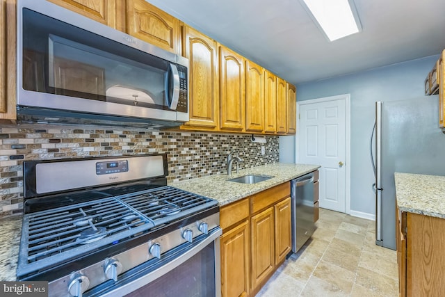 2864 Cushing Rd, Camden, NJ 08104 - kitchen with stainless steel appliances, decorative backsplash, light stone counters, light stone finish floors, and brown cabinets