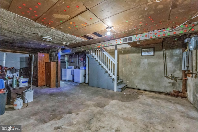 2864 Cushing Rd, Camden, NJ 08104 - unfinished basement featuring stairs and washer and clothes dryer