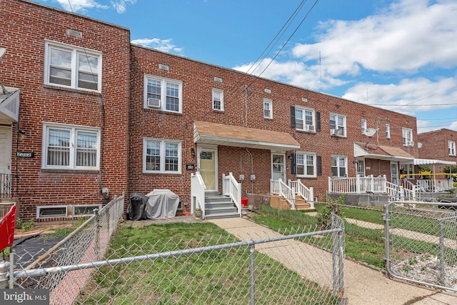 2864 Cushing Rd, Camden, NJ 08104 - multi unit property featuring brick siding and a fenced front yard