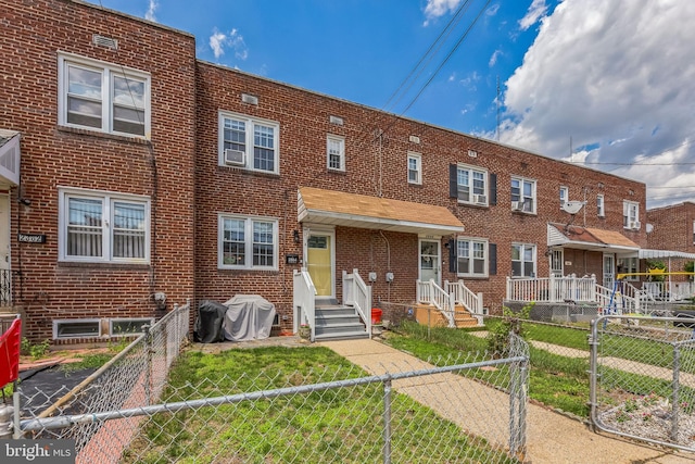 2864 Cushing Rd, Camden, NJ 08104 - multi unit property featuring brick siding and a fenced backyard