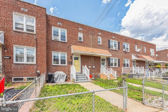 2864 Cushing Rd, Camden, NJ 08104 - view of property with brick siding and a fenced front yard
