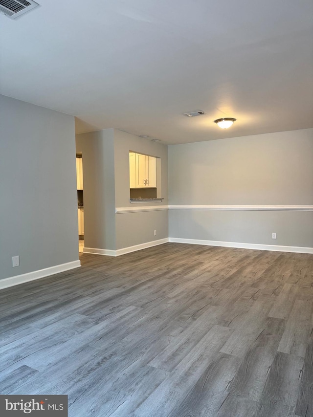 202 Grosvenor Lane 72 ( Apt. 3), Stafford, VA 22556 - empty room with dark wood finished floors and baseboards