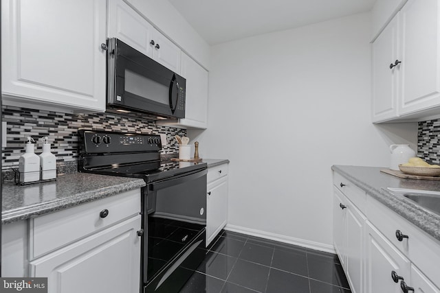 3460 Summit Ct NE Unit 3460, Washington, DC 20018 - kitchen with black appliances, dark tile patterned floors, decorative backsplash, and white cabinetry