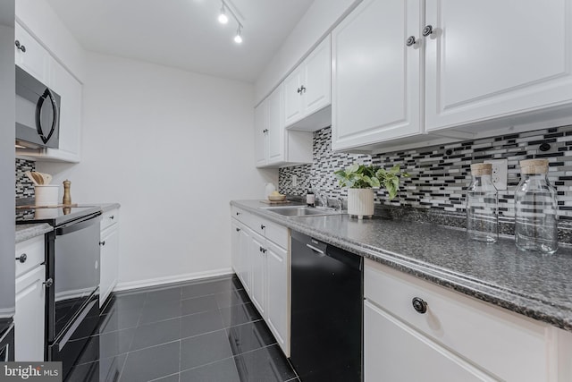 3460 Summit Ct NE Unit 3460, Washington, DC 20018 - kitchen with black appliances, decorative backsplash, white cabinetry, and dark tile patterned flooring